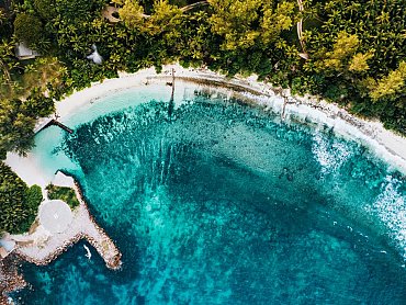 AERIAL IMAGE OF HELIPAD & BEACH 2 AT THE CAP LAZARE NATURE RESERVE, BEACH BAR & RESTAURANT