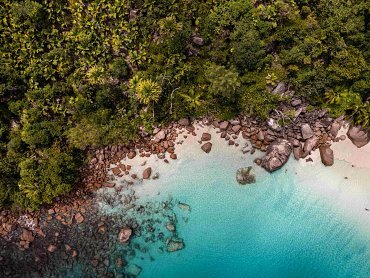 AERIAL VIEW OF SCENERY SURROUNDING ANSE LAZIO BEACH_11zon